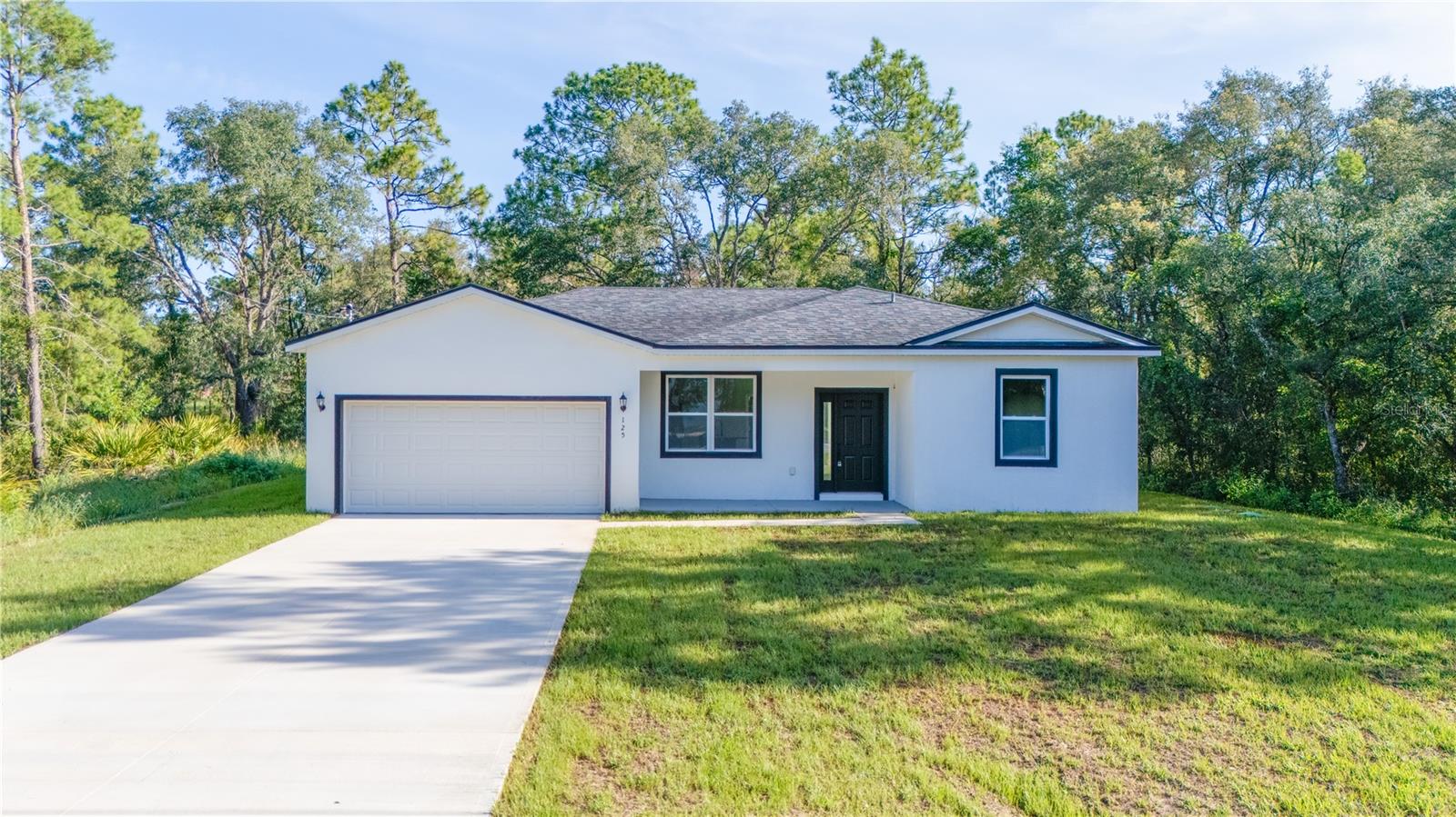 Step into modern comfort with this stunning new construction offering 4 bedrooms, 2 bathrooms, and a sleek, contemporary design. Featuring luxury vinyl flooring throughout, this home combines style, durability, and low maintenance living. The primary bathroom is a true retreat spacious, beautifully designed, and perfect for unwinding after a long day.Nestled in an area surrounded by nature and close to Lake Weir, you’ll enjoy a peaceful lifestyle while still being part of Ocklawaha growing community. Whether you’re seeking a full-time residence or a serene retreat, this property delivers the best of both worlds.Up to $15,000 in buyer incentives available for a limited time making your dream home even more within reach! Contact us today for details.