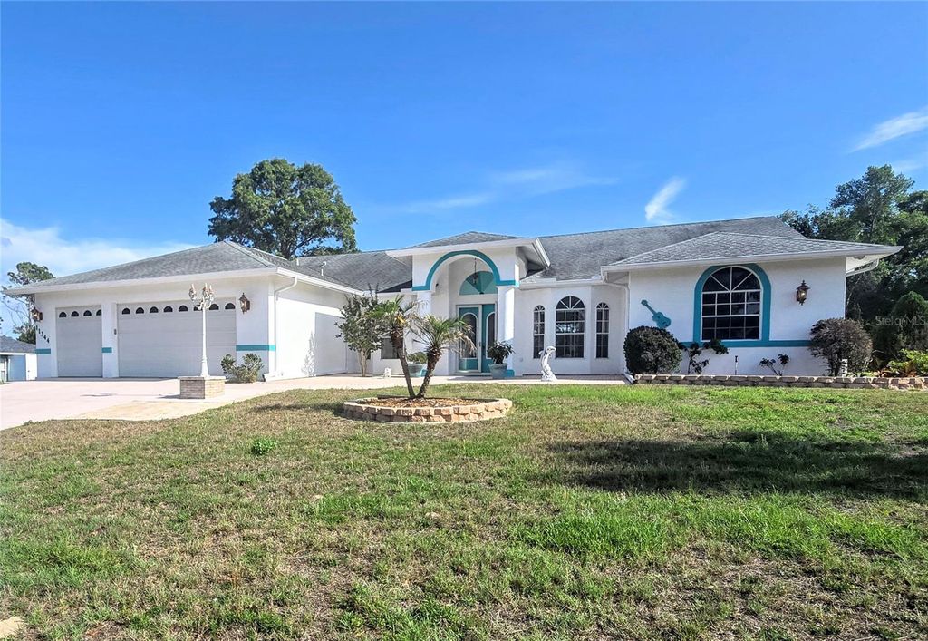 Photo of 11344 Rainbow Woods Loop, Spring Hill, FL 34609 (MLS # W7885340)
