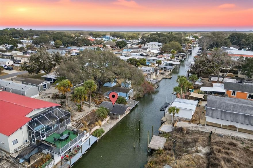 Waterfront Living in the Heart of Oak Hill – Direct Canal Access! This charming canal-front property situated on a generous 9,000 sq ft lot in one of Florida’s most desirable fishing communities. This home offers direct access to the water with your own private boat lift and covered fish cleaning station (fish house), making it a true paradise for anglers and boating enthusiasts.

Located just minutes from the world-famous Mosquito Lagoon, known for some of the best redfish and speckled trout fishing in the country, this property is ideal for those who love life on the water. Enjoy quick access to the Intracoastal Waterway and easy boating routes toward Port Canaveral.

Conveniently positioned near New Smyrna Beach, beautiful Atlantic beaches, and approximately one hour to Orlando International Airport, this home offers the perfect balance of peaceful waterfront living and accessibility to major destinations.

Whether you’re looking for a weekend fishing retreat, seasonal escape, or full-time residence, this canal-front gem delivers location, lifestyle, and endless potential.