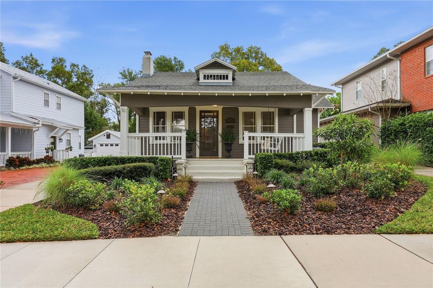 One or more photo(s) has been virtually staged. Adorable Delaney Park bungalow located close to the park, hospitals, shopping and schools. Wood floors throughout most of the house (master bedroom is new laminate), updated interior lighting. The kitchen has wood cabinets, granite counters and newer appliances. Primary bedroom has a walk in closet and beautifully updated ensuite bath. Inside laundry with washer/dryer included. Detached garage with door opener and small workshop. Newer AC, recently painted inside and out. Relaxing front porch with swing and all new landscaping. Great location allows a quick walk to Delaney Park, Dr Phillips Center, ORMC, and 903 Mills Market.