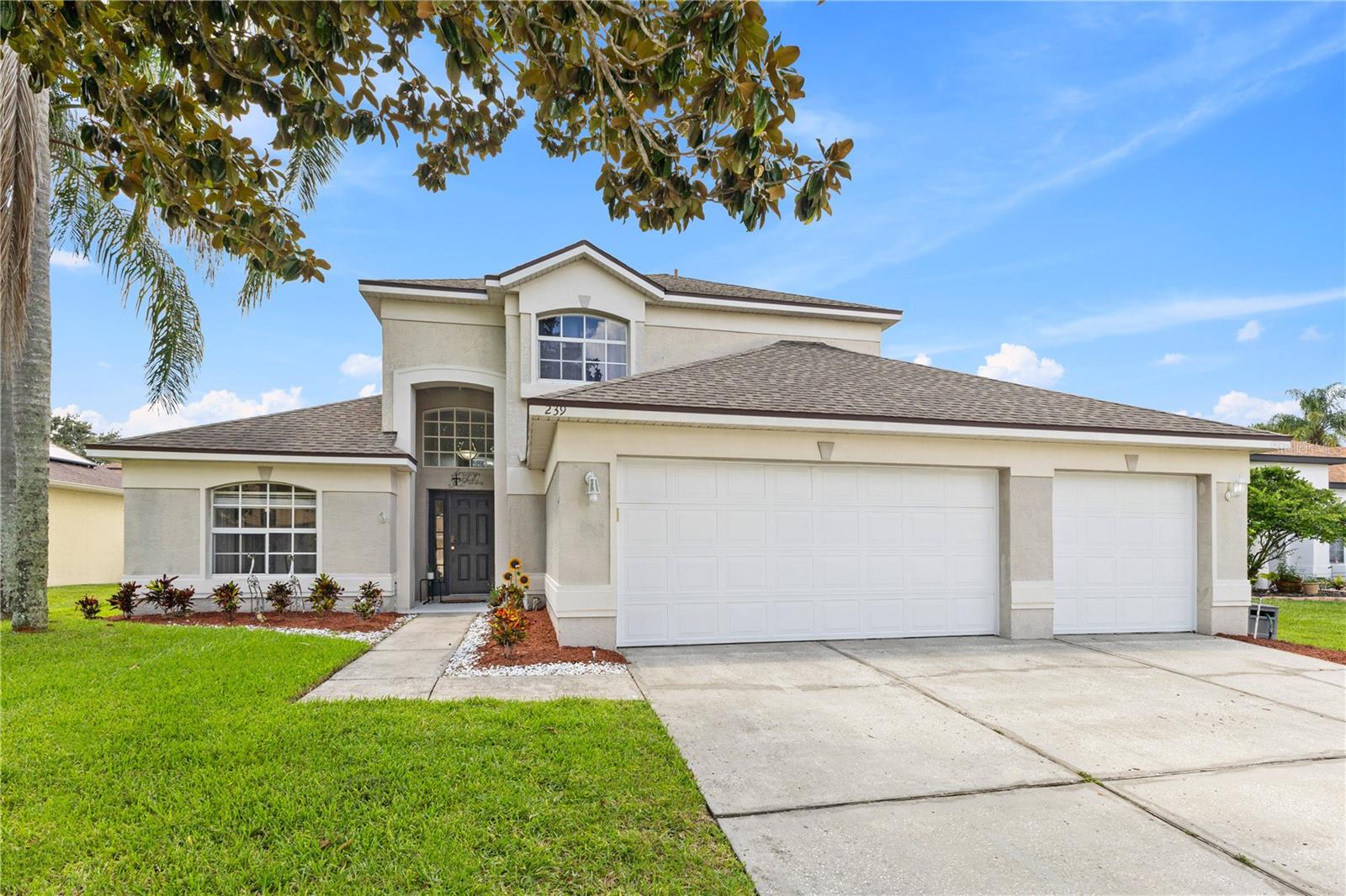 Under contract-accepting backup offers. RENOVATED HOME, OVERSIZED HEATED POOL, IN GATED WESMERE – 0.24 ACRE LOT
From the moment you arrive, the EXTRA-WIDE DRIVEWAY, MATURE TREES, and WELL-KEPT LANDSCAPING set the stage for this inviting home in one of Ocoee’s most sought-after communities: WESMERE, just off Maguire Road and minutes from WINDERMERE.
INTERIOR TOUR
Step inside the welcoming FOYER and into the OPEN LIVING ROOM with soaring 22-FOOT CEILINGS, sunlight streaming through tall windows, and a WOOD-BURNING FIREPLACE that anchors the space.
To the side, a FORMAL DINING ROOM with SLIDING DOORS opens to a RELAXING VIEW of the pool and backyard, creating the perfect backdrop for dinners and celebrations.
At the heart of the home, the RENOVATED KITCHEN combines STYLE and FUNCTION, featuring MODERN COUNTERTOPS, NEW STAINLESS-STEEL APPLIANCES, an ISLAND WITH SEATING, a PANTRY, and EXTRA CABINETRY for storage.
A HALF BATH is conveniently located downstairs for guests.
Also on the main level, the PRIMARY SUITE offers a PRIVATE HAVEN with calming POOL VIEWS, a WALK-IN CLOSET WITH BUILT-IN SHELVING, and a BEAUTIFULLY UPDATED BATHROOM featuring DUAL SINKS, NEW COUNTERTOPS, a WALK-IN SHOWER, and a DEEP SOAKING TUB.
Upstairs, you’ll find THREE BEDROOMS, including an OVERSIZED BEDROOM that works perfectly as a MEDIA ROOM, GAME ROOM, or SHARED BEDROOM for siblings.
OUTDOOR LIVING
Step outside to your COVERED LANAI overlooking the SCREENED-IN, HEATED OVERSIZED POOL. This backyard is designed for FUN AND RELAXATION, whether hosting friends, enjoying a weekend barbecue, or cooling off with a summer swim. Beyond the pool is a RARE OVERSIZED YARD with plenty of room for play, gardening, or future customization.
The EXTRA-WIDE DRIVEWAY and 3-CAR GARAGE WITH BUILT-IN CLOSETS complete the home with both style and practicality.
UPGRADES & FEATURES
• Renovations completed JULY 2025: NEW FLOORING throughout, FRESH INTERIOR PAINT, POOL DECK PAINT, BATHROOM COUNTERTOP UPGRADES, and FULL KITCHEN REMODEL
• NO CARPET anywhere in the home
• FULLY PAID-OFF SOLAR PANEL SYSTEM for energy efficiency
• HOA fees include INTERNET
COMMUNITY & LOCATION
Life in WESMERE means enjoying beautifully maintained surroundings and amenities such as TENNIS AND BASKETBALL COURTS, PLAYGROUNDS, and a COMMUNITY POOL.
Located just 15 minutes from DISNEY and close to shopping, dining, Publix, and Plantation Grove Shopping Center, with quick access to HWY 50, 429, and the FLORIDA TURNPIKE, making everyday commutes simple and convenient.
DON’T MISS THE CHANCE TO MAKE THIS HOME YOURS. SCHEDULE YOUR PRIVATE SHOWING TODAY!