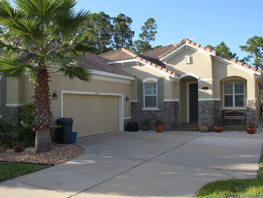 Venetian Bay single family home backing up to woods. Newer construction built in 2006. Home offers an amazing and elegant living space with an open floor plan, 9'.3" ceilings, upgraded light fixtures throughout, built-in entertainment unit with surround sound in living room, upgraded trim, bay window in kitchen nook, custom plantation shutters on windows. In the heart of the home you will find a completely remodeled gourmet kitchen with all wood cabinets and soft close drawers, granite counters, solid walnut counter top island with a stylish farm house sink, upgraded stainless steel appliances. This kitchen is functional and perfect for entertaining! Floors feature ceramic tile and engineered hard wood flooring throughout. Full lite doors in living area and in master suite leading to patio. Home offers a bonus room. Master bath features a walk-in shower and soaker tub, as well as a spacious walk-in closet with custom closet organizer. Cabinets and sink in laundry area. Other features include tile roof, exterior concrete construction, hurricane panels, 2 car garage with more built-in cabinets, new garage opener with keypad, pavers on patio and around the home. Freshly painted exterior, manicured front yard, screen-in lanai, fenced back yard. Room for a pool. Not only this home is functional but offers a cozy and homey feel! A must see! All measurements are approximate. ;Water: City