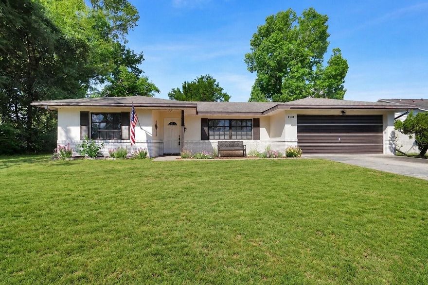 One or more photo(s) has been virtually staged. This well-maintained home is conveniently located near shopping, restaurants, Discovery Elementary, Dewey O Booster Park and I-4. The covered front porch entry welcomes you into this lovely 2 bedroom, 2 bathroom, home that has a Den/Study with AC giving you over 1300+ sq feet of living space. Oversized 2 car garage has workshop area, extra electric outlets, shelving for storage and a utility sink. Many updates include Roof 2019, HVAC just serviced and in great condition with a new motor in 2025, Septic pumped in 2023, Hot water heater 2015, Stainless appliances with French Door refrigerator, Glass top range with convection oven, exhaust hood vented to outside, pull-outs in cabinets and pantry with wood shelving. Open great room area is perfect for entertaining with living and dining together and connects to kitchen with a casual dining area. Open the sliders to the bonus room to use for playroom or Office. The kitchen has good counter space for preparing meals and plenty of cabinets for storage. The bedrooms are spacious and have good size closets. The hall bath has been updated with new vanity. The primary suite has a large walk in closet and en-suite bath with walk-in shower, updated vanity and linen closet. The fenced yard just needs 2-gates to provide a place for pets or play and has a paver patio for dining and cooking outside. The large shed in the backyard is great for storage or lawn equipment and is conveyed as is. The carpet is newer but could use stretching in areas and the gate has been removed from the fence but is available for buyer to repair. Perfect home for first home buyers, downsizing or 2nd home. Sturdy block construction with stucco. Some furnishings available for separate purchase. This home is under audio/video surveillance.