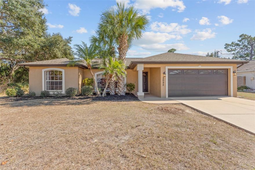 Home Is Where Memories Last, this home is move-in ready, featuring a split-plan home is packed with upgrades. Recent improvements include new interior and exterior paint, freshly painted garage walls and floor, brand-new carpet throughout, and professionally cleaned tile and grout. The screened lanai features new screens and a new ceiling fan, and new blinds and verticals have been installed throughout the home.

The kitchen offers stainless steel appliances, a pantry closet, and an adjoining dining area. The living room boasts a vaulted ceiling and a built-in TV niche, creating an open and inviting space. Outside, the backyard includes a screened-in lanai, a paver patio just beyond the lanai, and charcoal iron fencing installed in 2024.

Major systems have already been updated, including a 2.5-ton, 14 SEER A/C unit installed in September 2021 and a new shingle roof installed in March 2022. The backyard previously housed an above-ground pool; while the pool has been removed due to age, the sand pit and electrical remain for a buyer who wishes to install a new one.  Don't let the hole deter you, we do have a cost to fill it in and put new sod down for $ 2100.00 if you decide you don't want an above ground pool in the backyard.  

Conveniently located near I-75 for easy commuting to Sarasota or Fort Myers, North Port is known for its small-town charm, affordability, and growth. Enjoy close proximity to Manasota Key and Blind Pass beaches, Warm Mineral Springs Park, CoolToday Park (Atlanta Braves Spring Training), the North Port Aquatic Center, and shopping and dining at Cocoplum Village, Wellen Park or Punta Gorda. Take quick trips to Boca Grande, Fisherman’s Village, Sunseeker Resort at Charlotte Harbor, and enjoy easy access to Punta Gorda, Fort Myers, or Sarasota Airports.

Room Dimensions Are Approximate, Buyer needs to measure for exact dimensions.