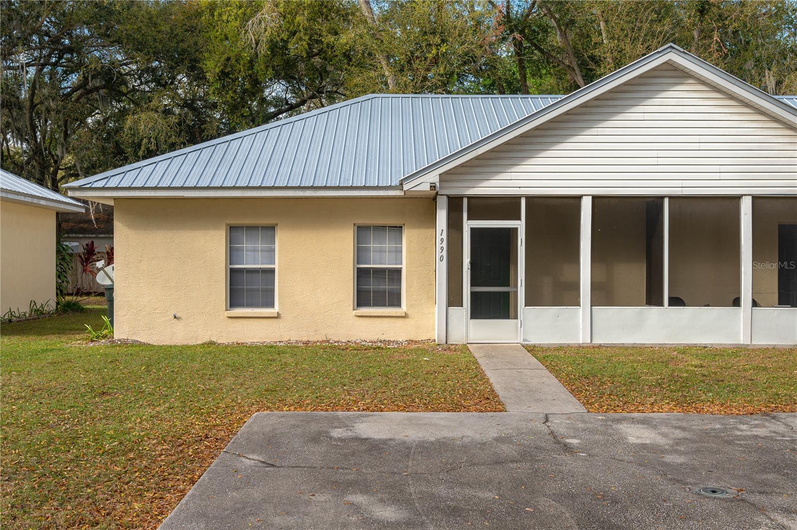Move in ready, recently renovated 2 bedroom 1 bathroom half duplex with front and rear screened enclosures. This home has recently undergone renovations to include new laminate flooring, new water heater, newer AC unit with UV sanitation in the Ductwork. Other additional features include 9 foot ceilings, open floorplan, and breakfast bar. Located on a quiet street with direct access to HWY 60 and HWY 17 convenient travel access. In addition the unit has a large rear yard for outdoor entertainment and the lawn care is included at no additional expense. This property is close to downtown Bartow, Walmart, Publix, and medical facilities. Make your appointment today to tour this move in ready property.