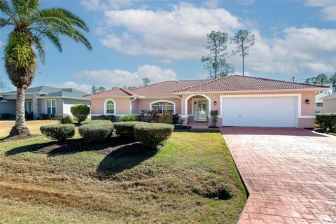 Photo of 134 Fenimore Lane, Palm Coast, FL 32164 (MLS # FC315756)