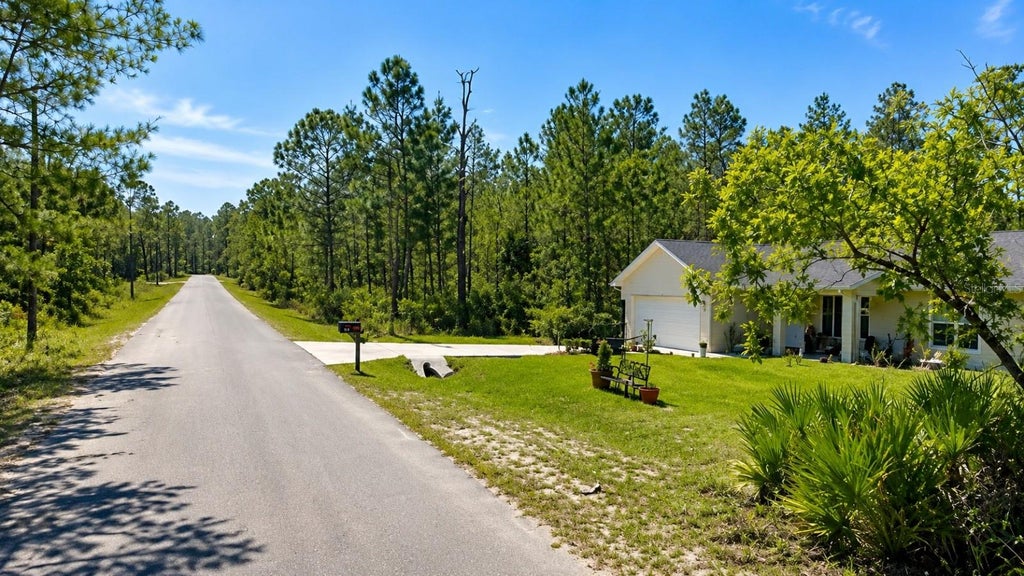 Photo of Malauka Pass Crse, Ocklawaha, FL 32179 (MLS # O6431161)