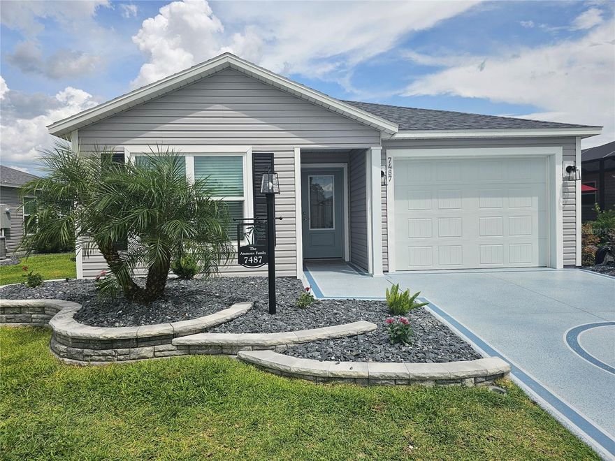 Move right into this highly sought after Moultrie Creek location with a beautiful, upgraded Haven model 2/2 villa. The must have tandem garage accommodates a car and a golf car and allows you to enjoy the full exciting Villages lifestyle. An adorable dining area adjacent to the bright, snow colored cabinets kitchen with quartz countertops, breakfast counter and stainless appliances overlooks the great room with ample space for entertaining friends. The primary bedroom is at the back of the home and has an ensuite bath with quartz sink top and shower. A second bedroom shares a guest bath with a tub/shower combination at the front of the home. A separate interior laundry room has a full-size washer and dryer included and has plenty of space for storage. Additional upgraded features on this oversized lot is a large Birdcage covered patio attached as an extension to the screened lanai, stacked Landscape block with rock, indoor and outdoor ceiling fans w/ lights, upgraded quartz counters throughout, farm style sink in kitchen and custom backsplash, custom painted driveway, Epoxy garage, additional custom cabinets in laundry room, glassed in showers in each bath and custom closet systems in each bedroom totaling over 40K in upgrades in this beautiful 2 year old home in this friendly and very active Village. 5 min from Eastport  and 5 min from Middleton where you have access to over 10 restaurants, a new publix is under consgtruction, you will be bookended by 2 city centers, a first in the villages. See this home before its gone! Front of home just had new landscaping and will replace Picture Saturday 5 30