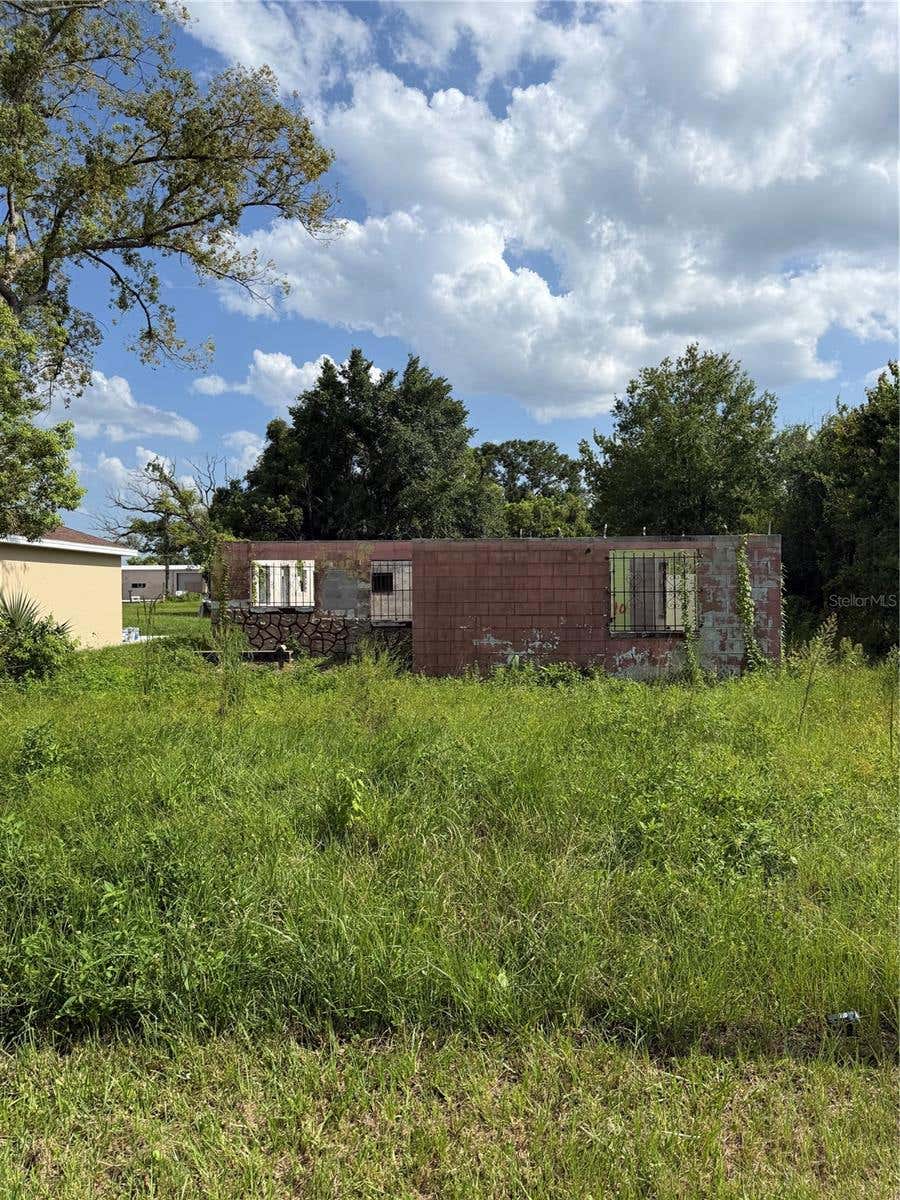 Photo of 2661 W 22nd Street, Sanford, FL 32771 (MLS # O6428230)