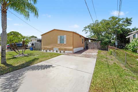 Photo of 739 Driftwood Lane, Tarpon Springs, FL 34689 (MLS # TB8538377)