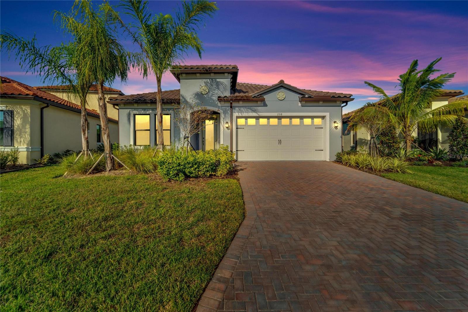 Welcome to Sanctuary Cove, a stunning gated marina community nestled in Palmetto. Offering the ultimate in resort-style living, this community features a luxurious clubhouse, state-of-the-art gym, refreshing swimming pool, and a private beach.
This exquisite 2022-built home boasts 3 bedrooms, 3.5 bathrooms, and a spacious den, all designed with exceptional craftsmanship and an abundance of natural light. From the moment you step inside, you’ll be captivated by the breathtaking sanctuary views and the privacy that comes with no rear neighbors.
The home’s interior is highlighted by elegant ivory 42" cabinetry and sleek quartz countertops. High-end custom lighting graces the kitchen, den, and dining areas, adding a touch of sophistication. Equipped with premium GE Profile appliances, including a gas range, oversized refrigerator, and microwave, this home is built for both comfort and style.
An open floor plan seamlessly connects the living spaces, creating the perfect environment for entertaining guests. The master suite offers the perfect retreat, with sweeping sanctuary views and a spa-like bathroom featuring dual vanity sinks and a luxurious double-head shower.
Storage is never an issue with spacious closets throughout, including walk-ins in both guest bedrooms, each with its own en-suite bathroom. Additional features include a tankless water heater for efficiency and hurricane-impact windows throughout the home, providing both safety and energy efficiency, especially during Florida’s storm season.
Conveniently located near Tamiami Trail, US-301, and I-75, you’re just minutes away from sandy beaches, shopping, dining, and the airport. This stunning Florida home offers affordable luxury and is ready for you to move in. Don’t miss your chance—this gem won’t last long!