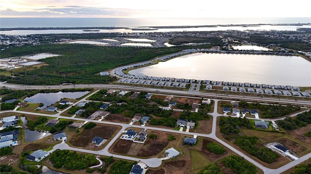 Photo of 116 Temper Lane, Rotonda West, FL 33947 (MLS # TB8460532)