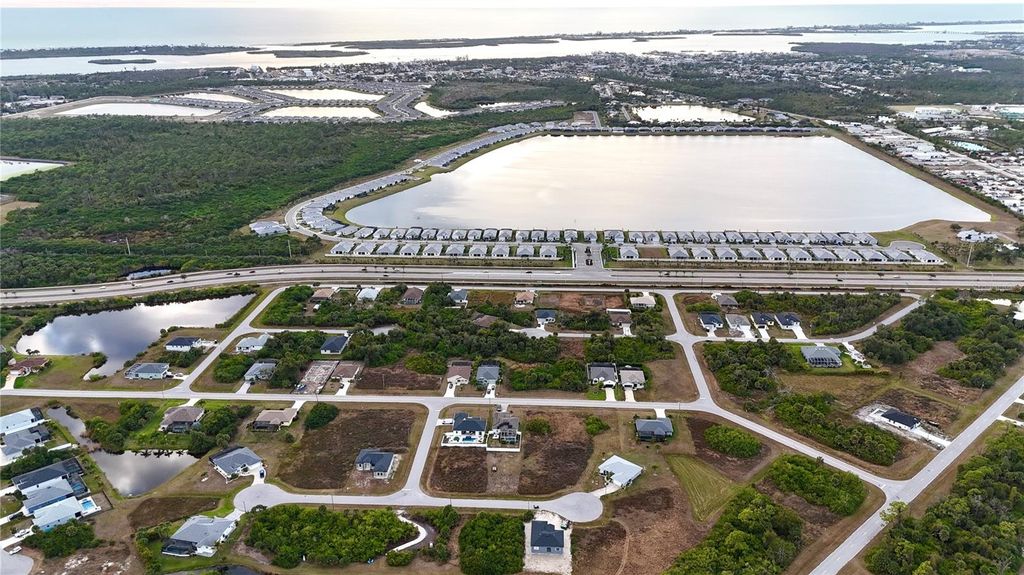 Photo of 116 Temper Lane, Rotonda West, FL 33947 (MLS # TB8460532)