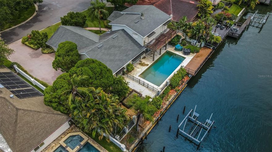 Build your dream home...BEACH PARK ISLES!!! You will love this beautiful established neighborhood. 11,155 sq ft  on a wide waterfront lot just about 10 houses from open bay. Deep water overlooking Culbreath Isles. No tree issues...very low traffic area with new construction!!! Excellent school district. Presently zoned Dale Mabry Elem., Coleman Middle and Plant High school. Enjoy living on the water and easy access to Gulf of Mexico, No Bridge issues. Close proximity to Tampa International Airport, Downtown Tampa, I-275 and major bridges. Currently has a 1974 house on property but being sold for LAND value.