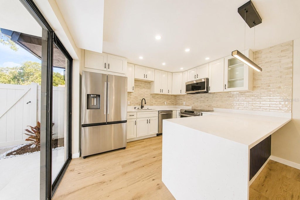 Photo of 4030 Shannon Brown Drive, Orlando, FL 32808 (MLS # O6427730)