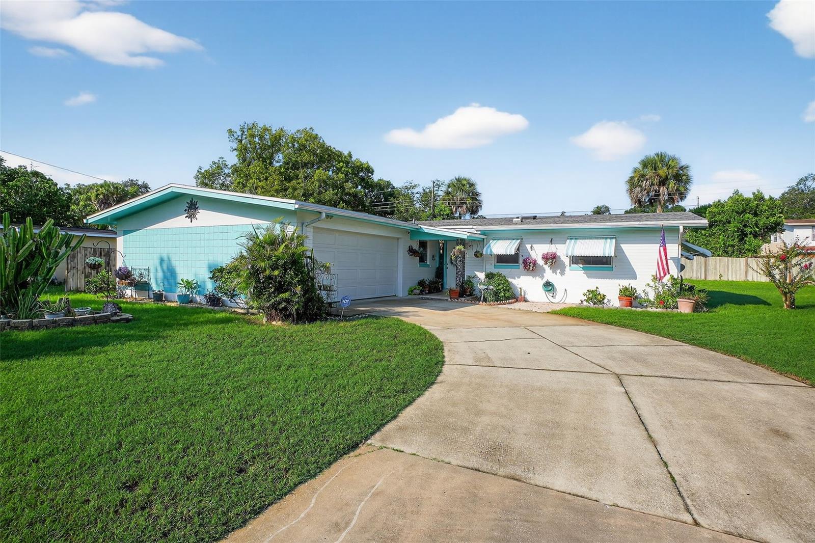 Welcome to your slice of paradise in Daytona Beach! This well-kept home at 650 Westward Circle combines comfort, style, and location perfect for full-time living, a vacation retreat, or an investment.Step inside to find an inviting layout with a spacious living room that flows seamlessly into a bright, open kitchen offering plenty of cabinet space for all your cooking needs. The home also offers an enclosed patio, perfect for enjoying your mornings with coffee or unwinding in the evenings. Out back, you’ll love the large fenced yard ideal for entertaining, grilling, or simply soaking up Florida’s year-round sunshine. The oversized driveway and garage make parking and storage easy.Other highlights include a roof from 2020, giving you peace of mind for years to come.Nestled in a quiet area, yet just minutes from the beach, local parks, shopping, and restaurants, this home puts you in the heart of everything Daytona has to offer while still providing a peaceful place to unwind.