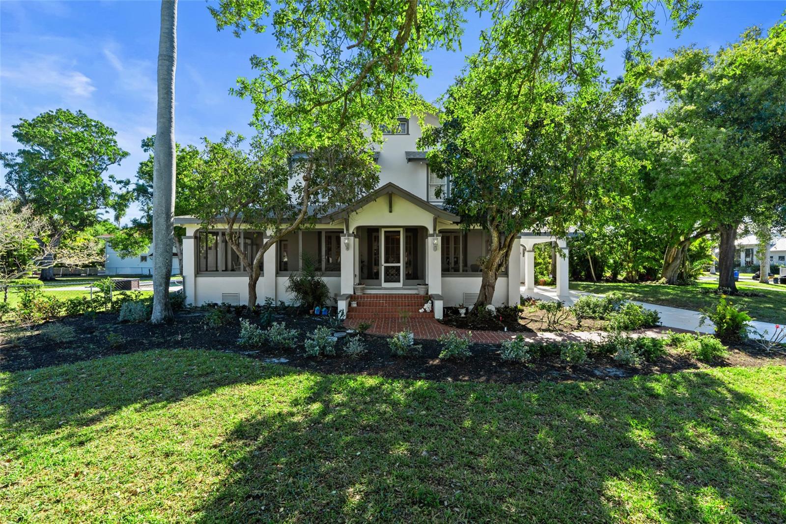 Imagine owning a genuine piece of Fort Myers history — a landmark estate built in 1922, from the very same era that gave rise to the legendary Edison home. This isn’t just a residence; it’s a legacy — the third magnificent home ever to grace the prestigious McGregor Boulevard. Lovingly cared for and thoughtfully preserved, it offers a rare blend of historical significance and modern peace of mind.
Set on nearly a full acre of lush, never-flooded grounds, this one-of-a-kind property quietly tells the stories of a bygone era while offering abundant space and endless potential for contemporary living. Step inside and be captivated by the old-world ambiance that fills every corner. The main residence features five spacious bedrooms, two full bathrooms, and a guest half bath, creating comfortable retreats for family and friends alike.
For added assurance, a new roof installed in 2023 ensures years of worry-free living, while the original heart pine floors lend timeless warmth and character throughout.
And the charm continues — included is a delightful efficiency unit complete with a full bath, ideal for guests, extended family, or potential rental income.
This is far more than a home; it’s a living piece of Fort Myers heritage. Picture yourself strolling through the sweeping grounds, feeling the echoes of generations past, and creating new memories within these storied walls.
Don’t miss your chance to own this rare Historic Landmark. This isn’t just a purchase — it’s an investment in a legacy, a home steeped in character, grace, and enduring charm. Seize this once-in-a-lifetime opportunity to become the next proud steward of this extraordinary McGregor Boulevard estate.