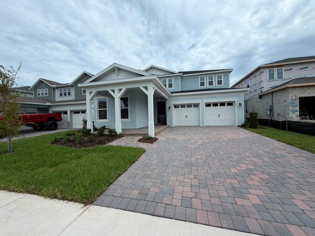 Photo of 467 Winter Grove Blvd, Winter Garden, FL 34787 (MLS # S5156515)