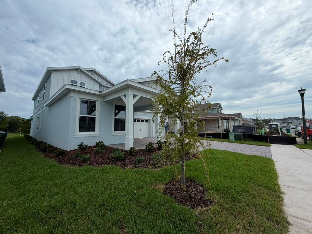 Photo of 467 Winter Grove Blvd, Winter Garden, FL 34787 (MLS # S5156515)