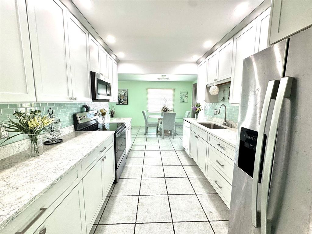 Photo of 1048 Porpoise Road, Venice, FL 34293 (MLS # TB8439382)