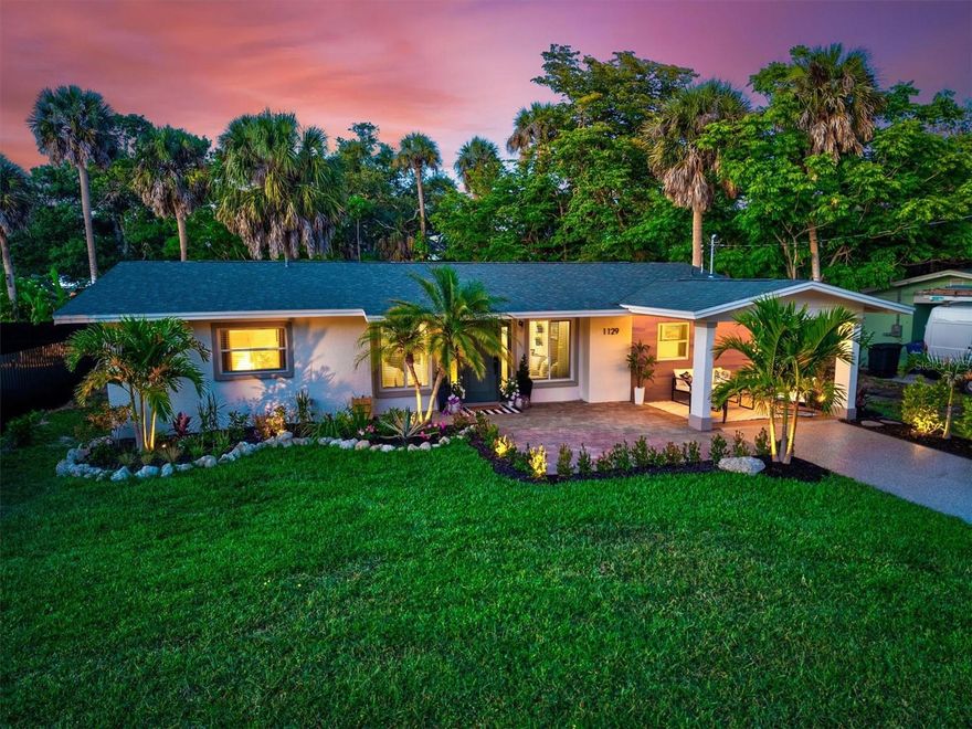 Completely remodeled inside and out, this stunning modern retreat is the definition of move-in ready and truly must be seen in person to fully appreciate the quality, craftsmanship, and attention to detail throughout. Offering 3 bedrooms, 2 bathrooms, and over 1,600 total square feet, this one-of-a-kind home combines modern luxury with the relaxed Florida lifestyle everyone is searching for, all just minutes from Venice Beach, historic downtown Venice, shopping, dining, and the Legacy Trail.
This home has never been lived in since completion of the renovation and shows even better in person than a model home. From the moment you arrive, the professionally designed tropical landscaping, architectural lighting package, and exceptional curb appeal immediately stand out. Inside, nearly every surface has been transformed with upscale custom finishes and designer touches throughout. Features include luxury vinyl flooring throughout the entire home, custom LED lighting integrated into crown molding and acoustic wood slat accent walls, recessed lighting, elegant pendant fixtures, and countless custom details in every room.
The stunning kitchen was designed to impress, featuring white soft-close shaker cabinetry, quartz countertops with a dramatic waterfall edge, matching stainless steel appliances, and an open-concept layout perfect for entertaining. The split floor plan provides both privacy and functionality, with spacious guest bedrooms and a luxurious primary ensuite wing offering a private office space, oversized custom closets, and a spa-like atmosphere.
Outside is where this property truly shines, featuring a resort-style backyard designed for year-round enjoyment with a putting green, hammock beach lounge area, firepit space, and multiple outdoor entertaining areas ideal for hosting family and friends. Additional upgrades include a new roof installed in 2023, brand new irrigation system, and over $15,000 invested into the custom landscaping and architectural lighting package alone. The property also offers an extended driveway along with additional side parking space, perfect for storing a boat, RV, trailer, or extra vehicles.
Whether you are searching for a primary residence, luxury seasonal getaway, or high-performing investment opportunity, this home checks every box. Turnkey furnished package available separately for an additional $15,000. Homes offering this level of renovation, style, location, and value this close to the beach rarely become available at this price point. Enjoy the freedom of no HOA or CDD fees, giving you added flexibility with fewer restrictions and lower carrying costs.