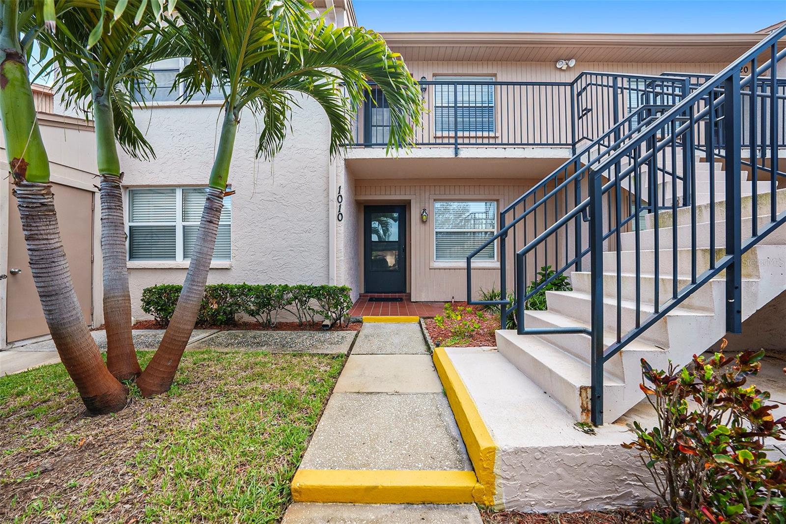 The seller is offering $10.000 credit with a full price offer. Why rent when you can own your own Florida getaway in this charming and affordable 2-bedroom, 2-bath condo located in a quiet 55+ community just minutes from historic downtown Tarpon Springs and the Gulf of Mexico? Enjoy low-maintenance living with a monthly condo fee that covers: Cable & Wi-Fi, trash & water, pest control, roof and exterior maintenance. Enjoy the serene and stunning lake view from your Florida room-perfect for morning coffee. There is an in-unit washer and dryer. Community amenities include: a beautiful pool, an active clubhouse with social events and shuffleboards courts. No CDD fees, no flood zone for extra peace of mind. This is your chance to own a piece of Florida paradise at an unbeatable value. Whether you're a seasonal resident or looking to downsize full-time, this home checks all the boxes. Schedule your showing today and start living the Florida lifestyle!