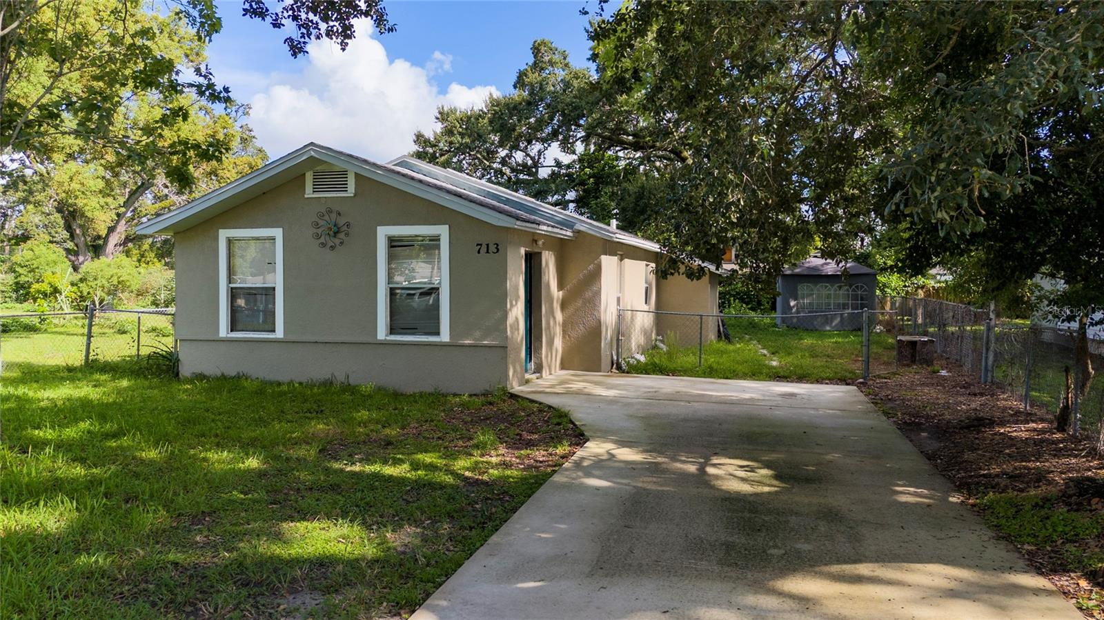 Versatile 3-Bedroom, 2-Bath Home with Private Guest Suite
Conveniently located just off I-4 and only minutes from downtown, this property offers the perfect blend of comfort and accessibility. Whether you’re commuting for work or looking for nearby shopping, dining, and entertainment, you’ll love the ease of this central location.
The main home features three spacious bedrooms and two full bathrooms with a flowing layout that makes everyday living simple and enjoyable. Natural light fills the living spaces, creating a warm and inviting atmosphere.
A unique highlight is the private 1-bedroom, 1-bathroom unit, complete with its own entrance, walk-in closets, and an indoor utility room. This flexible space is perfect for extended family, guests, or even generating rental income.
Outside, the treed lot provides shade and tranquility, giving you a peaceful retreat right in the heart of the city. With its combination of location, versatility, and charm, this property is a rare find you won’t want to miss!