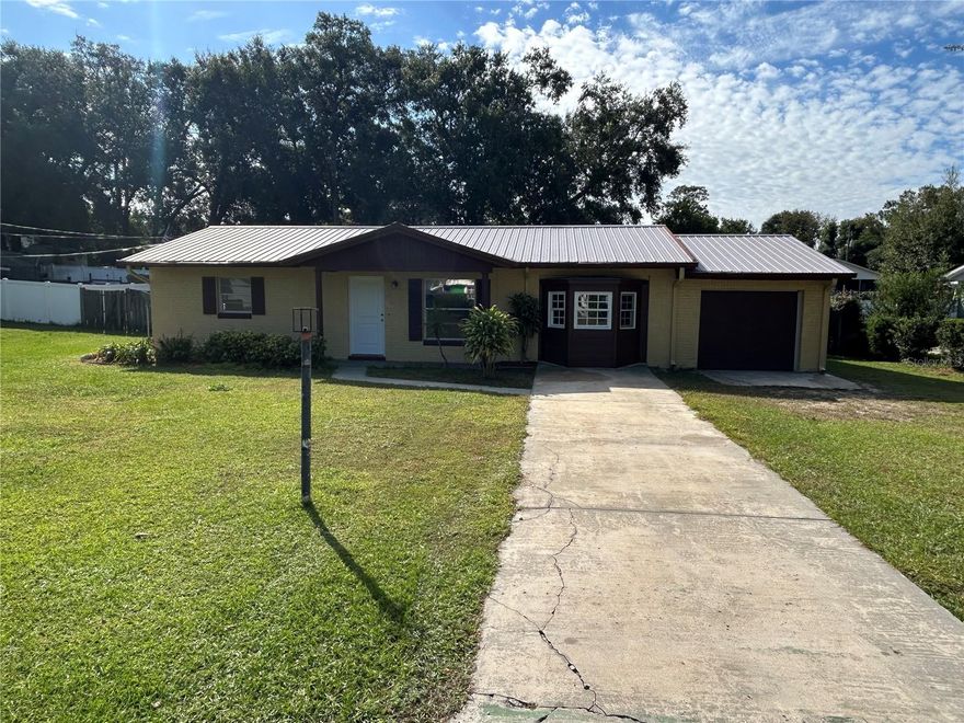 Move in ready home with fresh paint.  All floors are tile, and each room has a ceiling fan with light.  The house has upgraded trim with knockdown ceilings and walls. Large lot with shed and fencing.  Very nice home that is looking for a family.