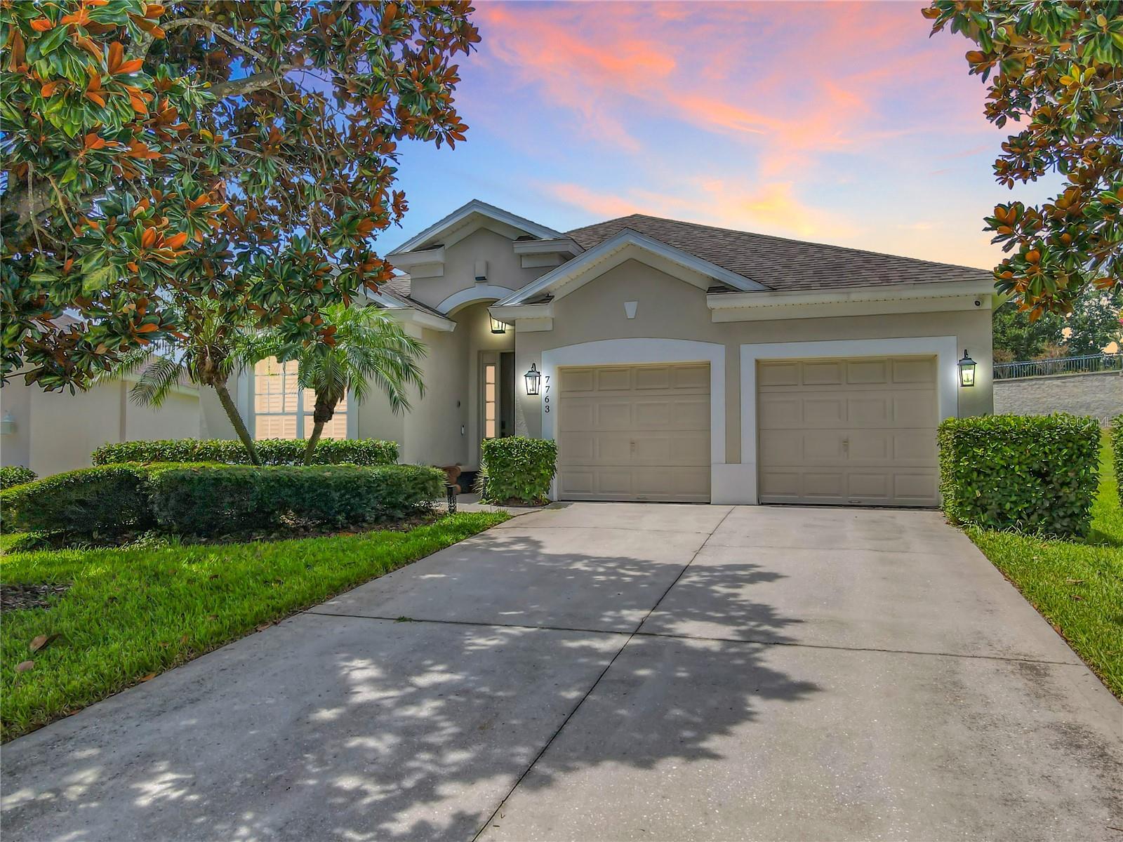MAGIC MOMENTS MANOR is a meticulously renovated, one-of-a-kind retreat in the gated Windsor Hills community, just two miles from Walt Disney World’s main gates in Kissimmee, Florida. This four-bedroom, four-bath villa offers four en-suite bedrooms—two primary suites with king beds and private baths, and two secondary bedrooms with queen beds—each featuring walk-in glass showers and stone countertops. The chef’s kitchen showcases modern finishes, a large waterfall-edged island, and ample seating at the island and a live-edge dining table. The living area is anchored by a 16-foot custom sectional and an 85-inch smart TV with soundbar and subwoofer, while a games room adds pool and foosball for friendly fun.
Key features:
*Southwest-facing, all-day sun with a sun-drenched pool and spa area
*Modern renovations throughout the home
*All en-suite bedrooms for ultimate privacy and convenience
*Oversized private back yard with no rear neighbors
Outdoor living includes a covered lanai, with a 50-inch outdoor TV, creating a luxurious and relaxing space for family getaways or entertaining. Conveniently located for easy access to Disney and other area attractions.
Don’t miss this opportunity. Schedule your private tour today. This is the one.