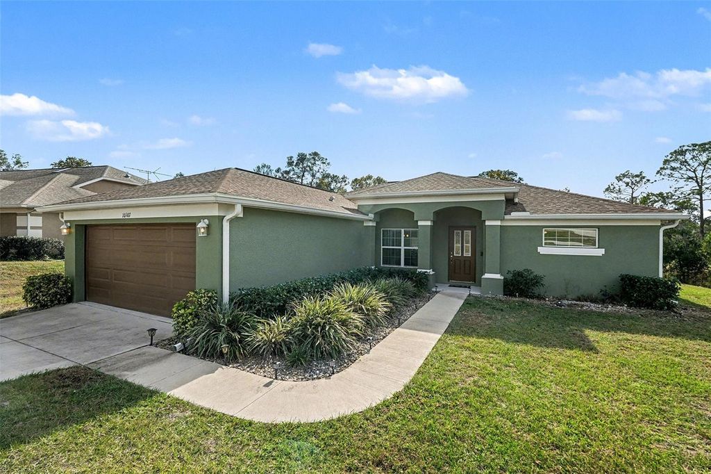 Photo of 10107 Sunburst Court, Spring Hill, FL 34608 (MLS # TB8455419)