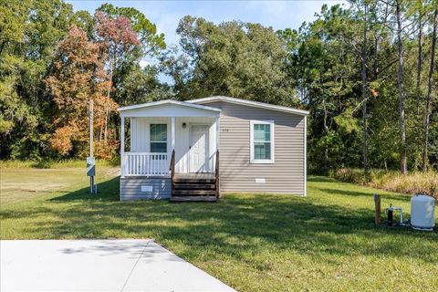 Photo of 326 Smith Road, Polk City, FL 33868 (MLS # O6361964)