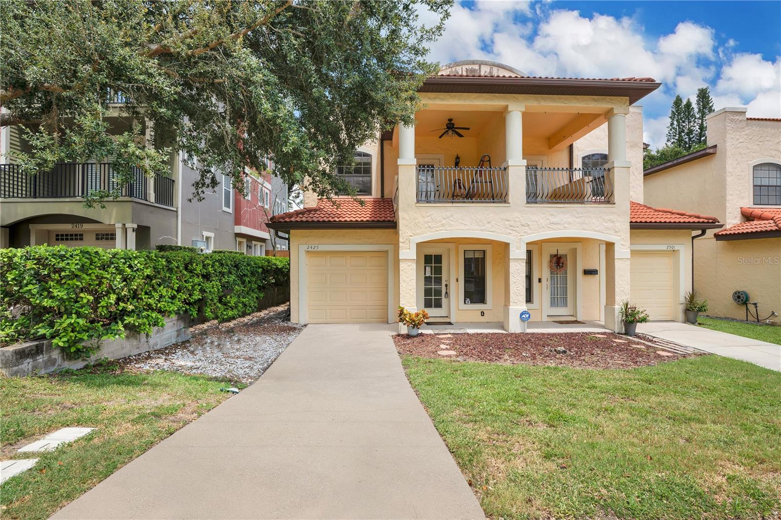 Live in style and comfort in this beautifully maintained Mediterranean-style townhome, tucked away on a quiet street in Orlando’s vibrant Milk District. This spacious 3-bedroom, 2.5-bath home features a bright open layout with wood-look tile flooring, a modern kitchen with granite countertops, stainless steel appliances, and elegant cherry cabinetry.
Upstairs, the primary suite offers a peaceful retreat with dual vanities, a soaking tub, separate shower, and private balcony. The front bedroom also includes its own balcony, filling the space with charm and natural light.
Step outside to a covered lanai and fully fenced backyard that backs up to lush green space with mature trees, providing extra privacy and calming nature views—perfect for relaxing or entertaining outdoors. Interior laundry with washer and dryer included.
Located just minutes from Lake Eola and Downtown Orlando, and very close to local restaurants, cafés, and nightlife.
Now available—schedule your private tour and enjoy peaceful living in the heart of the city.