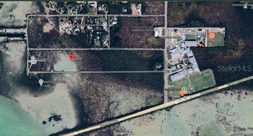 Rare opportunity to acquire approximately 10 acres of vacant residential land in Sugarloaf Key, an area known for its low-density character, natural surroundings, and limited land availability. Large parcels of this size are increasingly scarce in the Lower Florida Keys, positioning this property as a strategic long-term holding or future planning opportunity.

On Monroe county records, the property consists of a mix of hardwood hammock, transitional lands, and environmentally sensitive areas and is currently unimproved. The surrounding area is developed primarily with single-family residences, including custom and elevated homes designed in accordance with coastal and floodplain construction standards, preserving the residential and natural character of Sugarloaf Key.

The property offers convenient access to U.S.-1 while maintaining privacy and the authentic Keys environment. Any future use or development is subject to Monroe County Comprehensive Plan policies, Rate of Growth Ordinance (ROGO) allocation, environmental review, and applicable state and federal approvals.

Buyer is solely responsible for verifying flood zone designation, buildability, density, environmental constraints, ROGO availability, and all permitted uses prior to closing. No representations or guarantees are made regarding development rights or approvals.

ROGO-Focused Investor Note:
Properties of this scale in the Florida Keys are often acquired with a long-term entitlement or land-banking strategy. ROGO allocations are limited, competitive, and issued through a points-based system that may involve extended timelines. Investors familiar with Monroe County processes may view this parcel as suitable for future ROGO pursuit, mitigation planning, conservation strategies, or phased development concepts, subject to regulatory approval. No ROGO allocation is currently implied or guaranteed.  For GPS reference, use coordinates 24°39'35.2"N, 81°32'10.3"W. Property boundaries and exact location to be verified by survey.