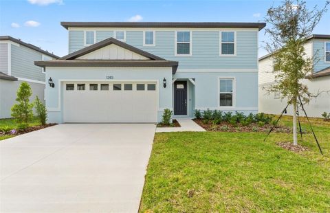 Photo of 1253 Lakeridge Way, Lake Alfred, FL 33850 (MLS # TB8434494)