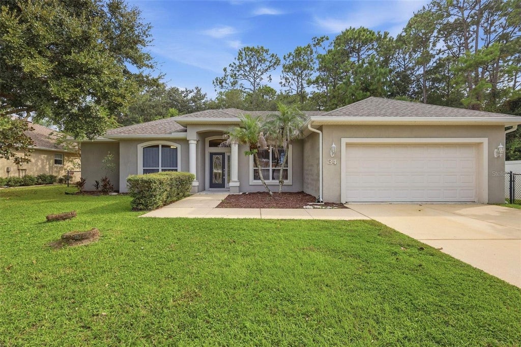 Photo of 34 Ocean Pines Drive, Ormond Beach, FL 32174 (MLS # V4951468)