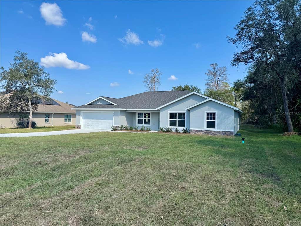 Photo of 7238 SW 125th Terrace Road, Ocala, FL 34481 (MLS # OM729685)