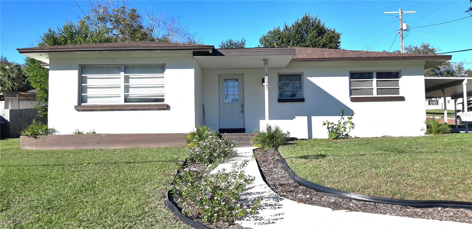 Nestled in an unbeatable location just moments from charming downtown Dade City, this spacious 3-bedroom, 2.5-bathroom home offers the perfect blend of comfort and convenience. Enjoy easy access to local shops, restaurants, the library, and the YMCA—all just a stone’s throw away!
Situated on a desirable corner lot, this home boasts oversized, versatile bedrooms that can adapt to your lifestyle. The updated kitchen features beautiful wood cabinets and sleek granite countertops. At the front of the house, you’ll find formal living and dining rooms perfect for entertaining, while the additional family room offers flexibility as a cozy retreat or a functional home office.
Practicality meets style with a large indoor laundry room offering ample storage space. Outside, the covered carport provides side-by-side parking for two vehicles, and the covered back patio is ideal for relaxing.
This home truly has it all—space, style, and a prime location. Don’t miss your chance to make it yours!