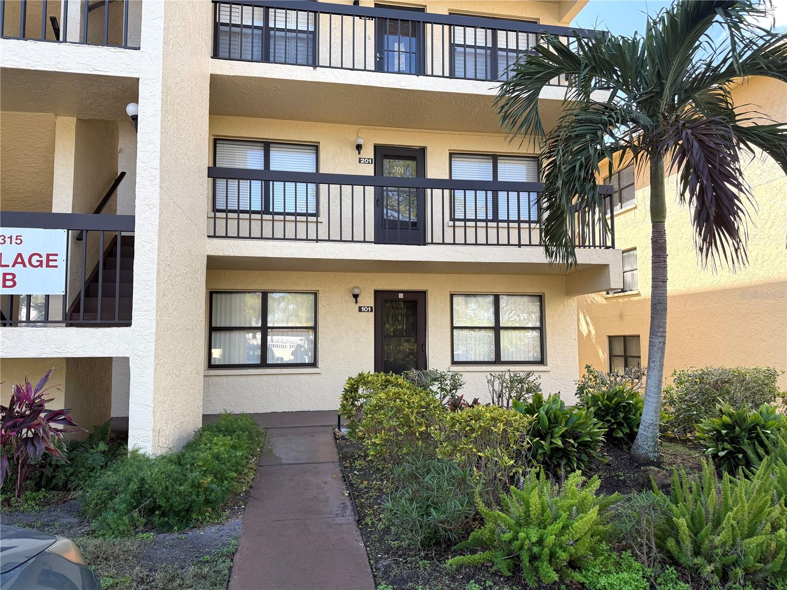 Bring All Offers! WOW! First floor end unit lakefront 2/2 condo with carport and washer/dryer, and furnished! It doesn't get any better than this! Enclosed Florida Room with exceptional lake and fountain views! Beautiful remodeled kitchen with extra cabinets and small family room/eat-in area off the kitchen. Beautiful brand new flooring throughout living area, new vanities, new paint. Nicely furnished with hand selected matching furniture. AC is less than 3 years old! Big walk-in closet and Covered parking near the condo entry and lots of guest parking right in front. Gazebo with grills located to the rear of this condo with exceptional views out the back. Clubhouse, Tennis, Pickleball, shuffleboard, exercise room and big heated community pool. Desoto Square Villas is gated 24/7 and is wonderfully maintained by full time management company. Fees have been kept very reasonable to make for owner affordability. Located near shopping, restaurants and a quick drive to beautiful beaches. Active community with very friendly neighbors and lots of activities. Don't miss this one as it has it all and is priced to sell