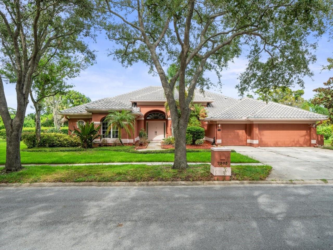 One or more photo(s) has been virtually staged. Welcome to the Exclusive Bayou Club!
Nestled in one of St. Petersburg's premier gated communities, this spacious 5-bedroom, 3.5-bath home offers an inviting open floor plan, soaring vaulted ceilings, and abundant natural light throughout.
Designed for both comfort and entertaining, the home features a bonus room (ideal for an office or den or 5th bedroom), a soundproof media room, and a generous living area with a cozy gas fireplace. The chef's kitchen is equipped with a gas cooktop (2018), double ovens (2018), refrigerator (2018), and a gas dryer hookup option, along with plenty of counter space for gatherings.
Retreat to the expansive primary suite with its spa-like bath, with bidet in the water closet, complete with a soaking tub and oversized his-and-hers walk-in closets. The split floor plan ensures privacy for family or guests.
Step outside to your private backyard oasis, where a pool and spa with birdcage enclosure create the perfect setting for year-round enjoyment. There is a gas grill bib hook up outside the screened enclosure of the pool. The extra-large fenced yard is beautifully landscaped and maintained with an irrigation well pump (2000).
Additional upgrades include two new 4-ton HVAC units (2024), a Generac whole-home gas generator (2018), gas water heater, and a spacious 3-car garage. All utilities are underground. Hurricane shutters for all doors and windows.
Located just minutes from downtown St. Pete, award-winning Gulf beaches, and major highways, this home blends privacy, convenience, and resort-style living. The Bayou Club community offers 24/7 guarded security consisting of two guards on duty at all times, one at gate, one patrolling the picturesque grounds, and optional Country Club membership with golf, tennis, fitness, and dining. Also, the Bardmoor Country Club is within minutes. Sam's Club, Publix and Lowes down the street.
This meticulously maintained, one-owner home is a rare opportunity in a sought-after neighborhood. Schedule your private showing today!