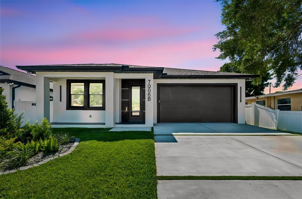 Photo of 7006 Thatcher Ave #B, Tampa, FL 33614 (MLS # TB8505819)