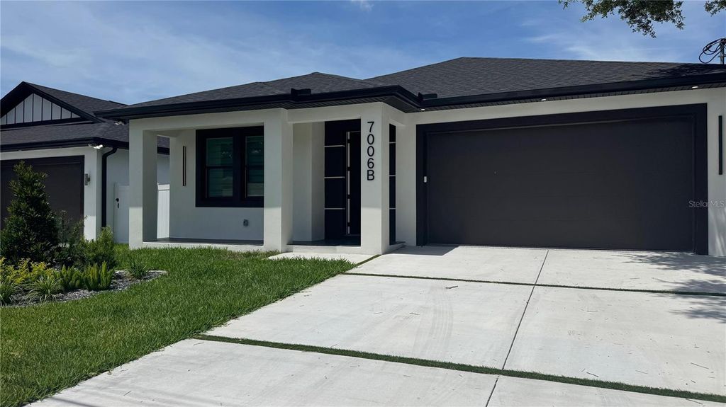Photo of 7006 Thatcher Ave #B, Tampa, FL 33614 (MLS # TB8505819)
