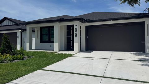 Photo of 7006 Thatcher Ave #B, Tampa, FL 33614 (MLS # TB8505819)