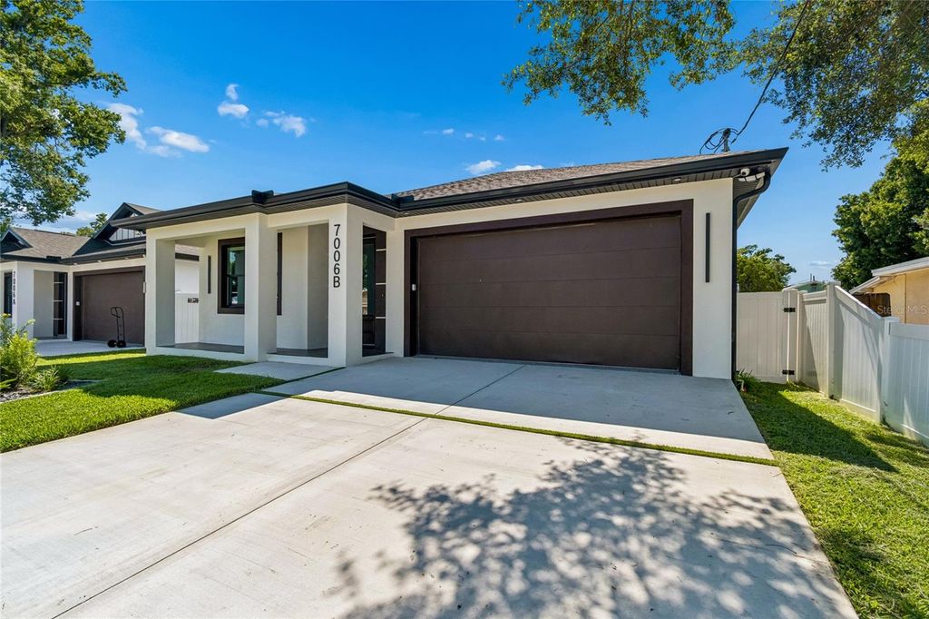 Photo of 7006 Thatcher Ave #B, Tampa, FL 33614 (MLS # TB8505819)