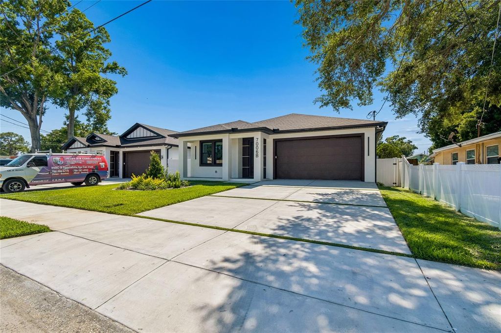 Photo of 7006 Thatcher Ave #B, Tampa, FL 33614 (MLS # TB8505819)