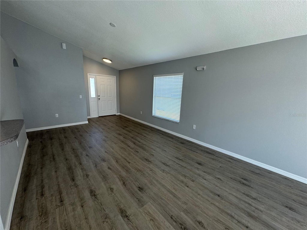 Photo of 158 Aylesbury Lane, Davenport, FL 33837 (MLS # O6442661)