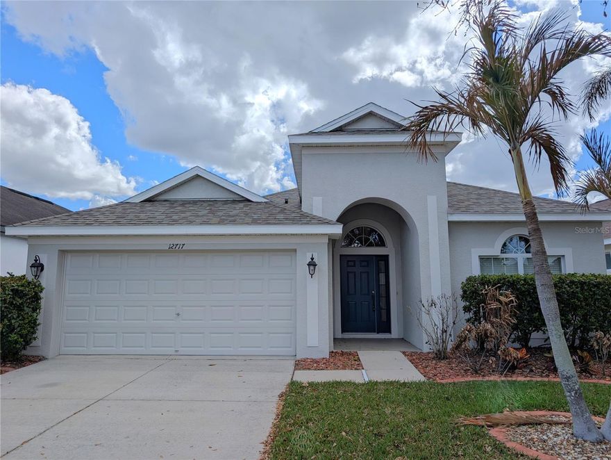 Experience the perfect blend of modern style and peace of mind in this beautifully maintained 3-bedroom, 2-bath home offering 2,048 square feet of comfortable living with a bright, open floor plan designed for everyday living and entertaining. Natural light fills the home, highlighting the durable laminate and tile flooring throughout for easy cleaning and long-lasting appeal. The kitchen features stainless steel appliances and overlooks the main living areas, creating a seamless flow for gatherings and daily life. Enjoy relaxing Florida evenings on the screened patio while overlooking the fenced backyard, perfect for pets, play, or outdoor entertaining. A brand-new roof installed in 2026 adds valuable peace of mind for years to come. With its generous layout, inviting natural light, and great indoor-outdoor living space, don’t make a decision without seeing this home first!