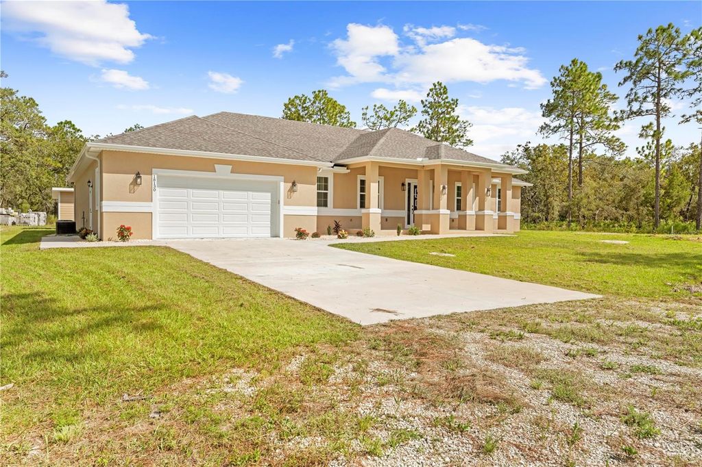 Photo of 18130 Parrot Road, Weeki Wachee, FL 34614 (MLS # TB8436128)