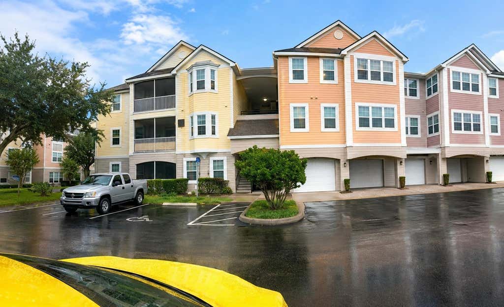 Photo of 6413 Astor Village Avenue #201, Orlando, FL 32835 (MLS # O6434194)