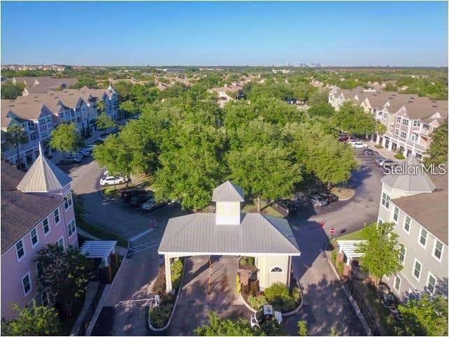 Photo of 6413 Astor Village Avenue #201, Orlando, FL 32835 (MLS # O6434194)