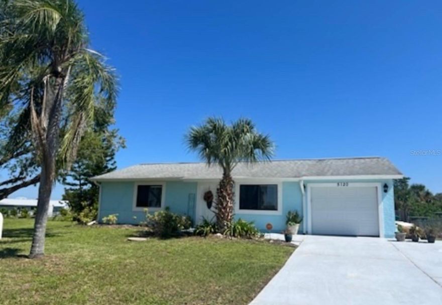 Short Sale. Discover this charming home located on a pond in Port Charlotte featuring two bedrooms and one bath. The bright, open-concept layout includes a lovely enclosed Florida room with sliders leading to a spacious deck on a private back yard, perfect for enjoying your morning coffee or unwinding with an evening cocktail in this peaceful neighborhood. Situated on an oversized, fenced lot, this home offers an indoor laundry room, updated kitchen including granite countertops, stainless steel appliances, and cabinets. There are ceiling fans and the water heater, AC and roof were new in 2017. Electric panel upgrades in 2022. This well-maintained home is move-in ready and waiting for you to enjoy lakeside living at its best.
